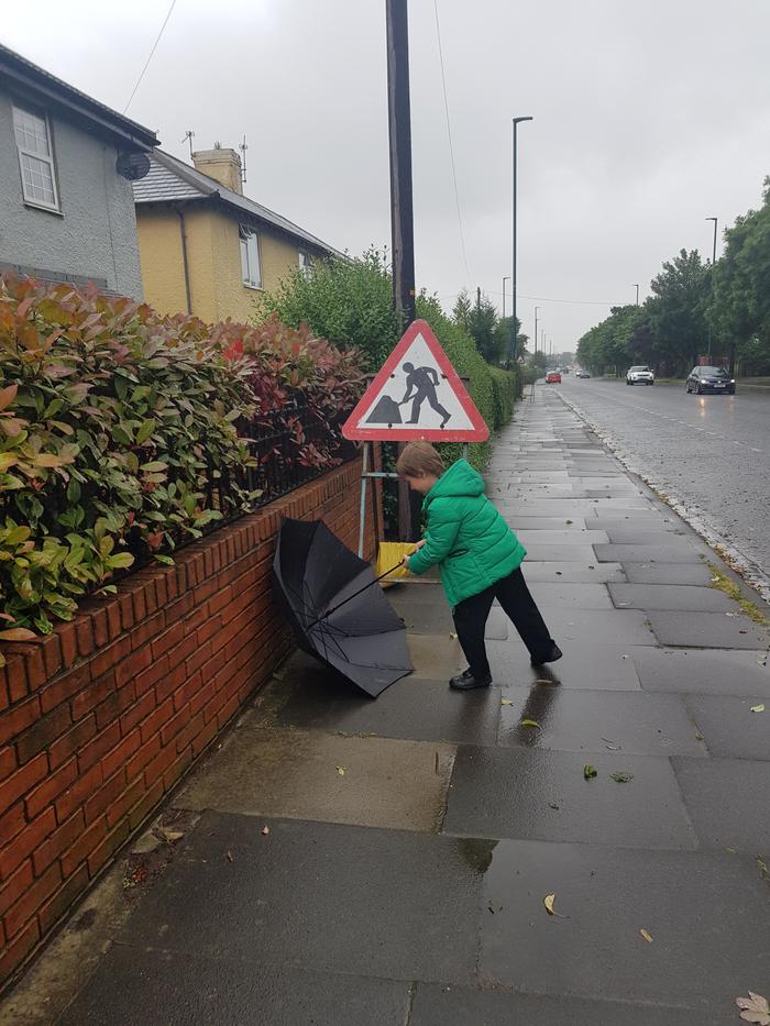 My son doing what the sign says haha.
