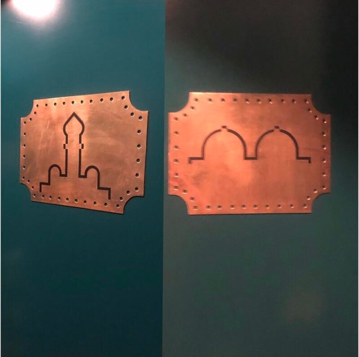 Bathroom signs at an Indian restaurant in Madrid