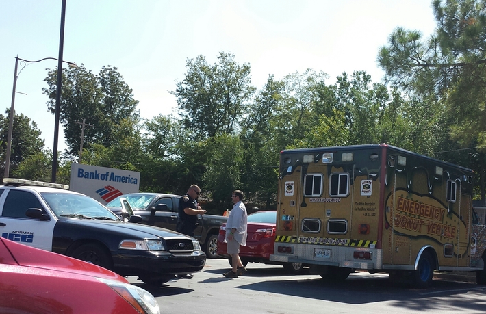 I can't believe I actually got a picture of the cops pulling over the Emergency Donut Vehicle.