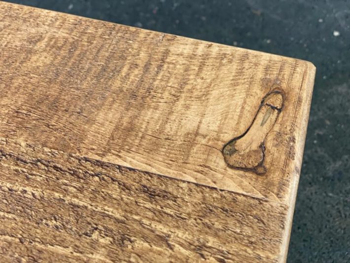Industrial table makers find naturally penis-shaped knot. Decide to auction the table off to raise money for testicular cancer.
