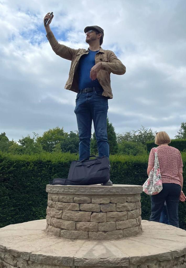 My wife took a picture of me taking a selfie. It was only later that we saw the interesting fold in my pants.