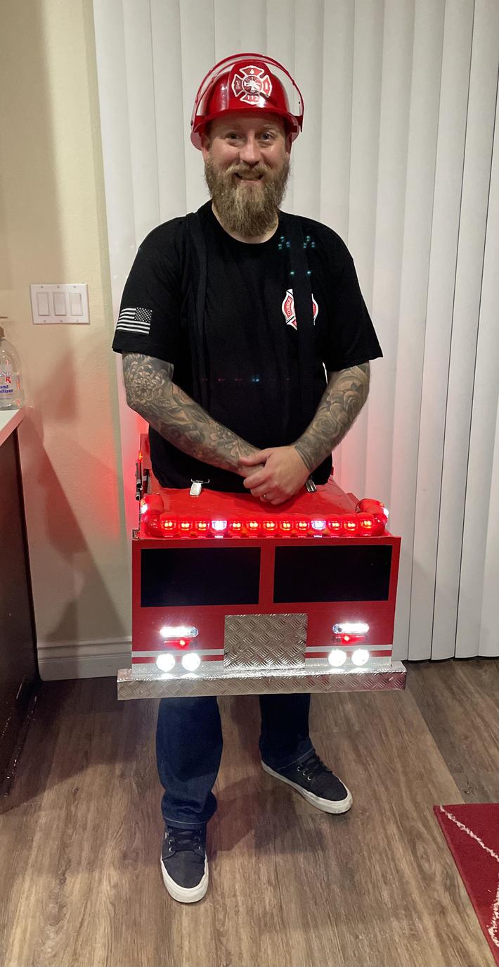 Wife said I was too fat to be a sexy fireman &amp; I should be a firetruck. Jokes on her, now she has to go trick-or-treating with me while the flashing lights on my costume give the neighborhood children seizures