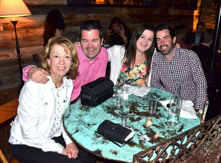 That one time Drake photobombed my families photo (With Rihanna sitting with him).