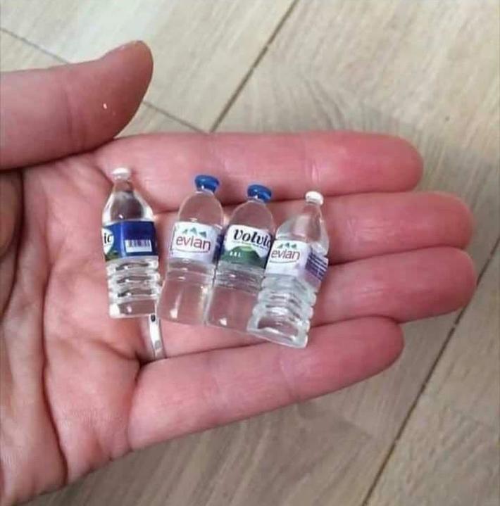 mini bottles for fisherman.. to make the fish look bigger