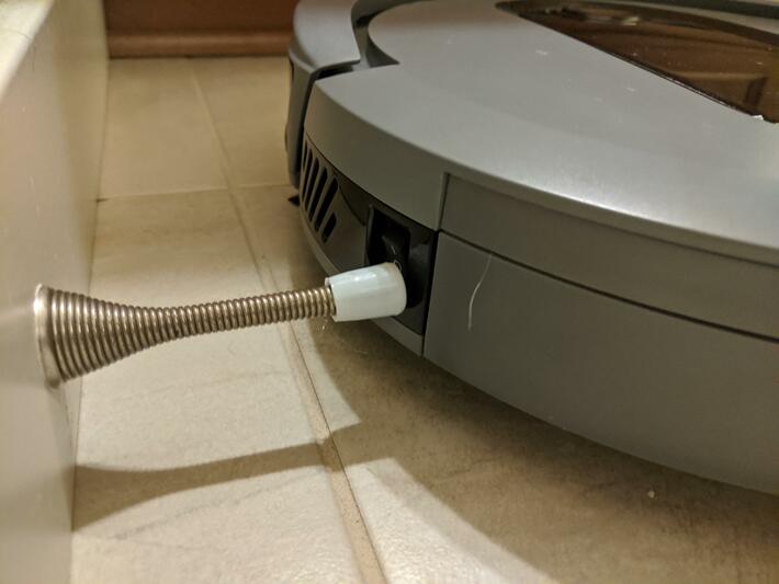[OC] Apparently my robot vacuum is on strike. Found it in the bathroom, where it used the doorjamb to shut itself off.