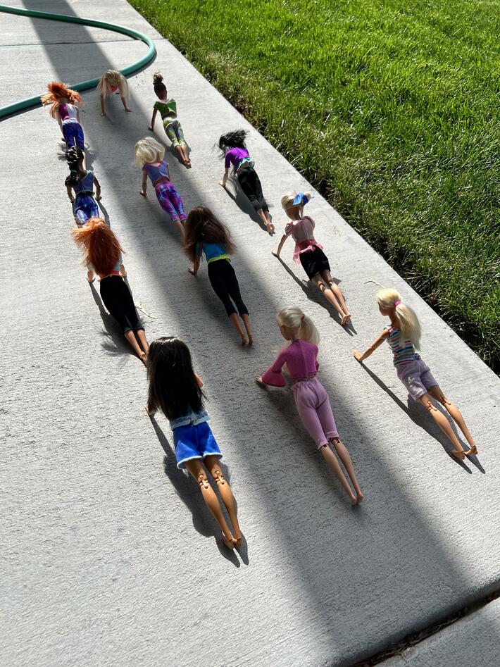 My 10 year old daughter loves to set her barbies up in elaborate scenarios. This was the scene on our back patio the other day. These ladies have been at this for hours. 😁