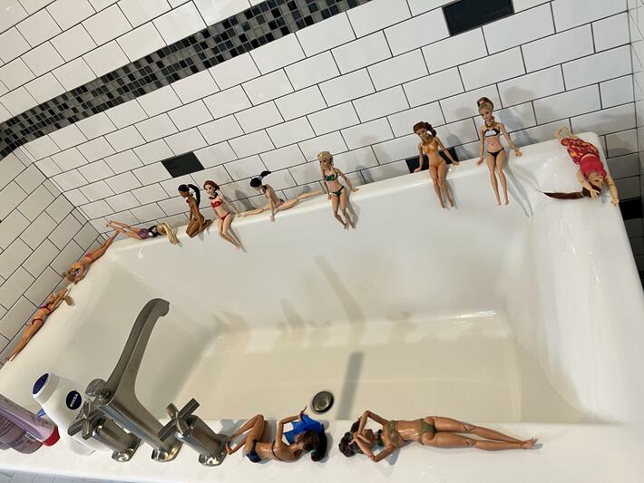 The aftermath of my daughter and her barbies using my tub tonight.
