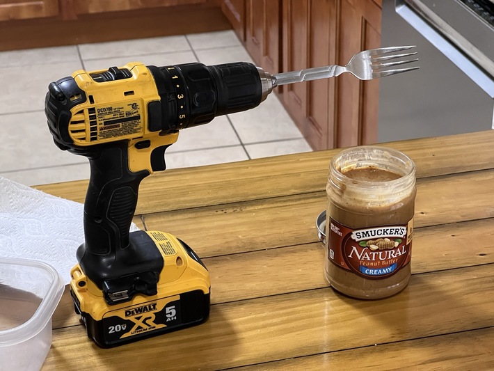 My wife thinks my method for stirring a new jar of natural peanut butter is funny but, hey, it works.