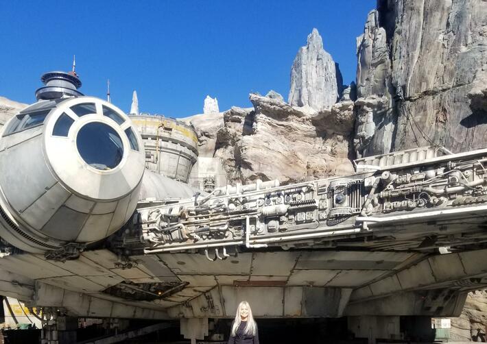 I asked my son to take a picture of me at Disneyland.