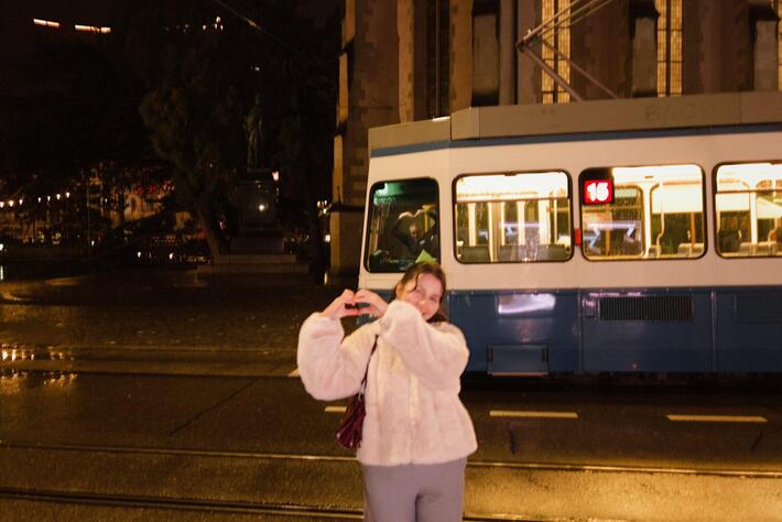 Look at the man driving the tram